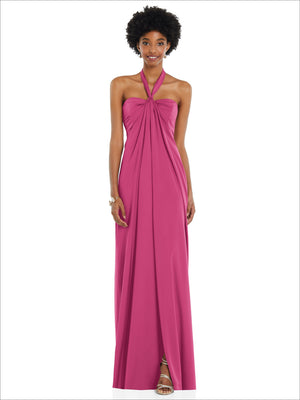 Pink satin halter column gown with bow detail at neckline and draped skirt