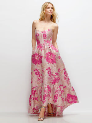 Floral strapless corset-style high-low dress with pink hibiscus print and ruffle hem