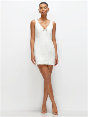 Ivory shimmer tweed sleeveless mini sheath dress with V-neck and rhinestone trim