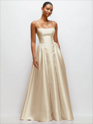 Satin maxi dress in ivory with scoop neckline, spaghetti straps, and gathered waist details.