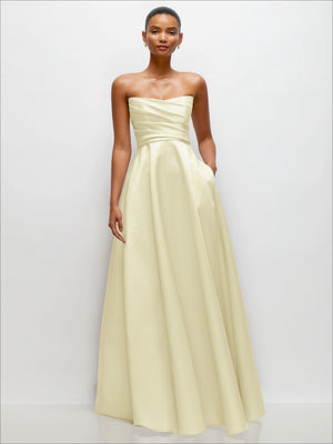 Strapless satin maxi dress in pale yellow/ivory with draped bodice and full skirt