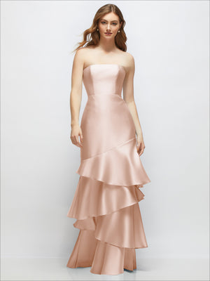 Light blush strapless bodycon maxi dress with tiered ruffle skirt, standing pose