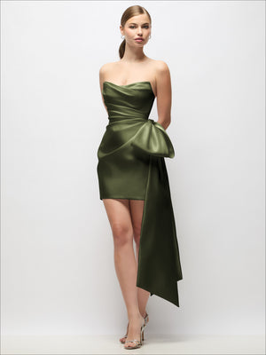 Strapless satin mini dress with pleated waist and long tail bow—olive green, covered buttons.