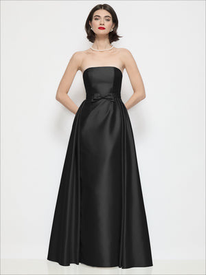 Strapless satin column dress with bow-waist overskirt, black, front