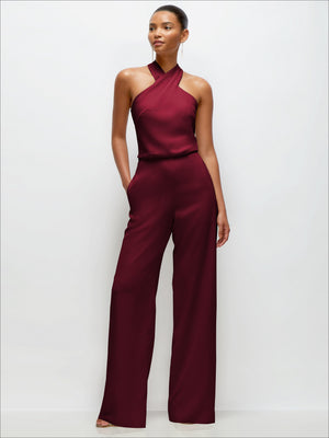 Burgundy halter jumpsuit front view with blouson bodice and wide-leg crepe pants
