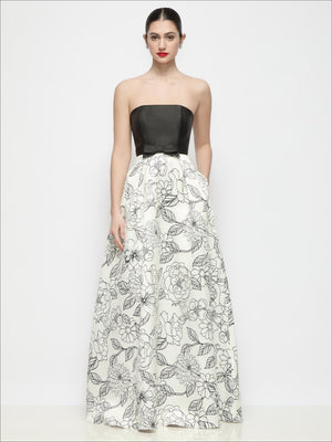 Strapless satin maxi dress with black bodice and white floral circle skirt, front view