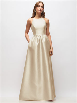Sleeveless satin maxi dress in ivory with sleeveless bodice and gathered skirt.