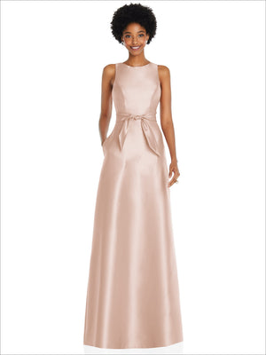 Blush jewel-neck sleeveless maxi dress with tied waist sash and V-shaped neckline
