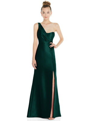 One-shoulder satin trumpet gown in deep green, fitted waist, front slit.