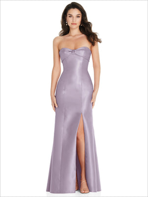 Lilac strapless satin trumpet gown with sweetheart neckline, front slit, and bow detail