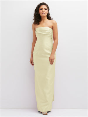 Pale yellow strapless draped column dress with smooth fitted bodice