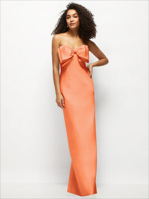 Strapless satin column maxi dress in coral orange with large bow detail at neckline