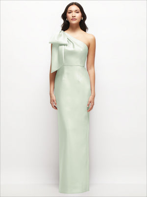 Sage green satin one-shoulder maxi dress with oversized bow drape at shoulder