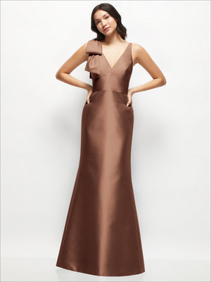Chocolate satin trumpet dress with deep V-neck front and one-shoulder cascading bow ruffle.