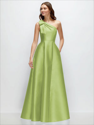 Lime green satin one-shoulder maxi dress with bow accent, full A-line skirt.