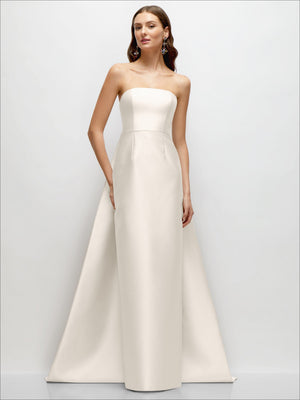 White strapless satin column dress with structured bodice and long flowing skirt