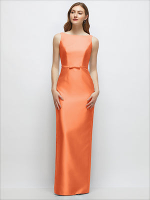 Peach satin column dress with bateau neck and bow-trimmed skinny belt