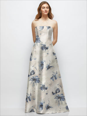 Off-white strapless satin floral gown with full skirt and blue flower pattern