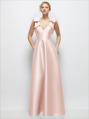 Blush satin ball gown with deep V-neckline and shoulder bows, sleeveless.