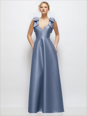 Blue satin ball gown with deep V-neckline and shoulder bows, sleeveless with full skirt.