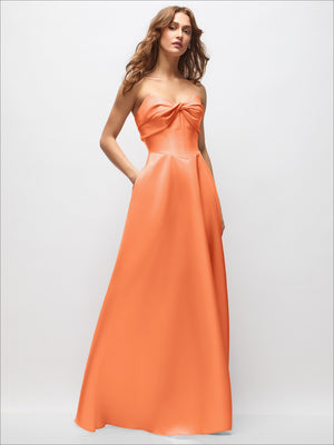 Orange satin strapless maxi dress with twisted neckline bow and full skirt