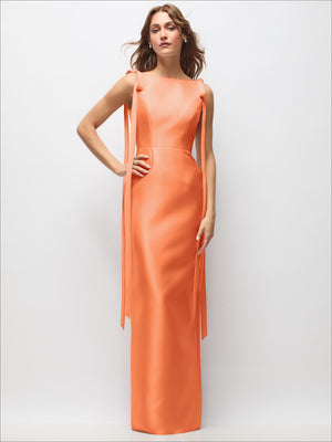Orange satin column maxi dress with boat neck and long tail bow straps