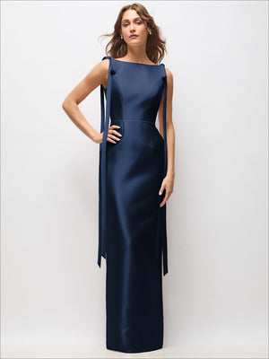 Navy satin column maxi dress with bateau neckline and long exaggerated bow strap tails