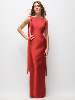 Red satin column maxi dress with bateau neckline and long tail bow straps