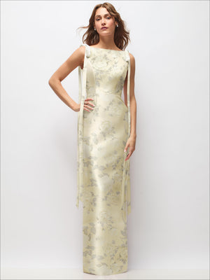 Pale yellow floral satin maxi dress with bateau neckline, sleeveless column silhouette, bow tie straps