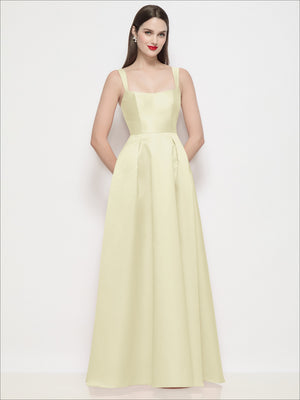 Lemon satin maxi dress with spaghetti straps, shaped bodice, pleated skirt