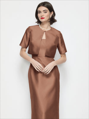 Jewel-neck cropped satin jacket in chocolate-brown satin with matching long skirt, front