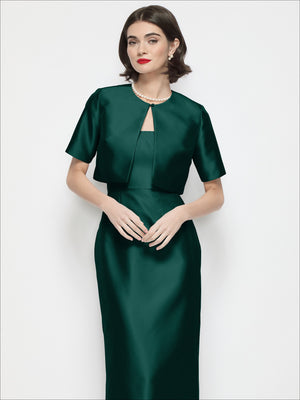 Dark green satin cropped jacket with jewel neckline and short sleeves, front view.