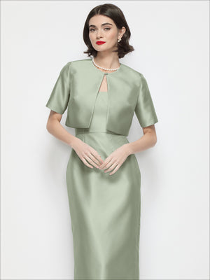 Cropped satin jacket with jewel neckline, short sleeves, front keyhole placket, sage green