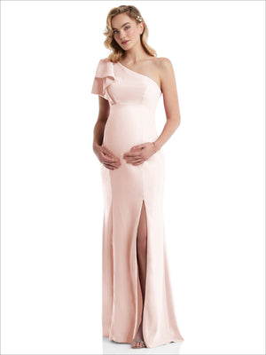 One-shoulder maternity trumpet gown with ruffle sleeve and side slit, blush pink.