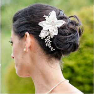 brunette bride with wedding updo hairstyle