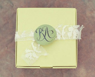 green favour box tied with lace