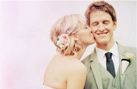 style me pretty yvonne wong photography bride with flowers in hair and groom