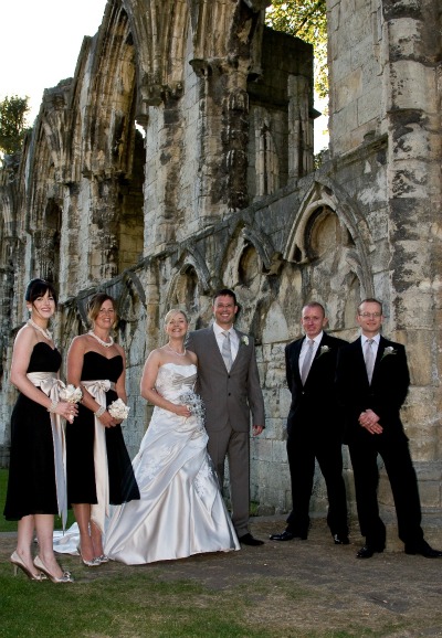 Bridal party at Museum Gardens in York bridal party photographed by romantic ruin