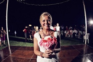 bride with toss bouquet_picnik bride tossing bouquet to bridesmaids