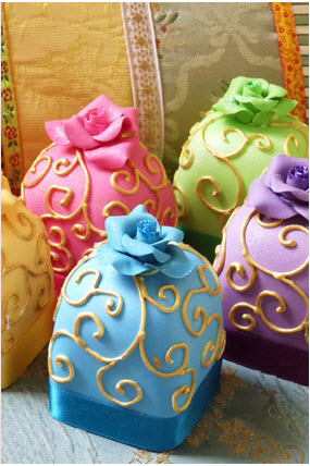 Bollywood pink blue and green cakes by Rachelle's cakes pink, blue and green cupcakes