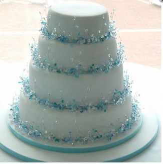 White wedding cake tier white wedding cake with blue decoration