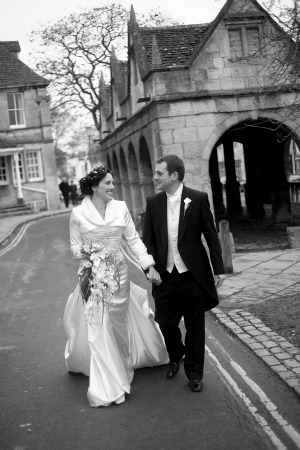 bride and groom in Gloucestshire village bride and groom in Gloucestershire village