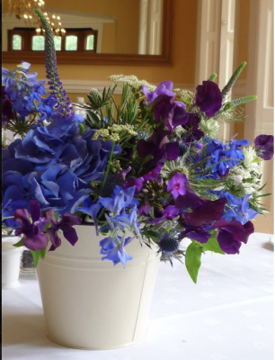 blue flowers by G Lily blue flowers in bucket