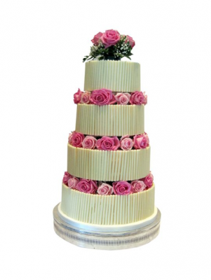 Wedding cake by GC Couture Tier cake decorated with roses