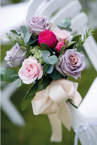 via Brides purple and pink rose tied bouquet