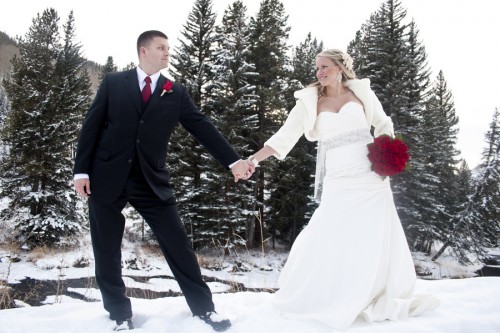 bride and groom in snow bride and groom in snow