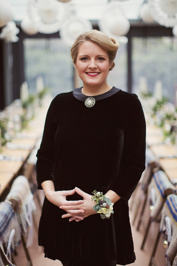 Mark Tattersall photography Bridesmaid in black velvet dress with Peter Pan collar