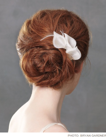 bride with updo with flower