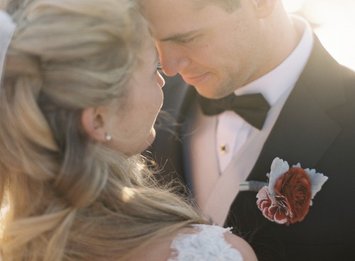 bride and groom embracing