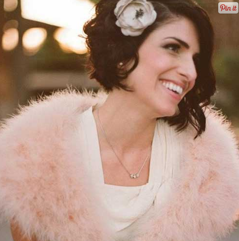 bride with short hair and flower accessory